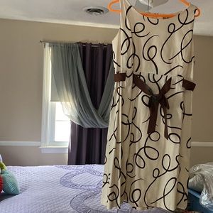 The little brown and white outfit for lunch and into cocktail hour.